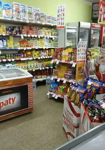 Góndolas de golosinas, lácteos y bebidas en Autoservicio Milaye